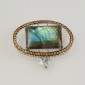 9. Brooch, 18kt gold, labradorite, citrines 
