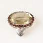 3. Brooch / pendant, 18kt gold, smoked quartz, garnets
