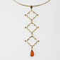 15. Pendant, 18kt gold, black diamonds, fire opal 