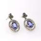 2. Earpieces, 18kt gold, tranzamites, diamonds 