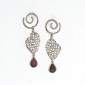 10. Earpieces, 18kt gold, garnets 