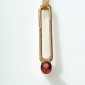 2. Pendant, 18kt gold, diamonds, hessonite