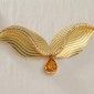 4. Neckpiece, 18kt gold, diamonds, yellow sapphire (close up)