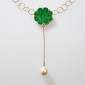 2. Neckpiece, 18kt gold, tzavorite, diamonds, pearl