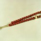 7. Worry beads, 18kt gold, cornelian