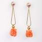 6. Earpieces, 18kt gold, south sea pearls, coral flowers 