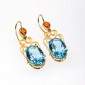 11. Earpieces, 18kt gold, fire opals, blue topaz 