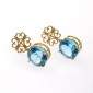12. Earpieces, 18kt gold, blue topaz 