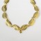 neckpiece, 18kt gold, diamonds, yellow sapphire